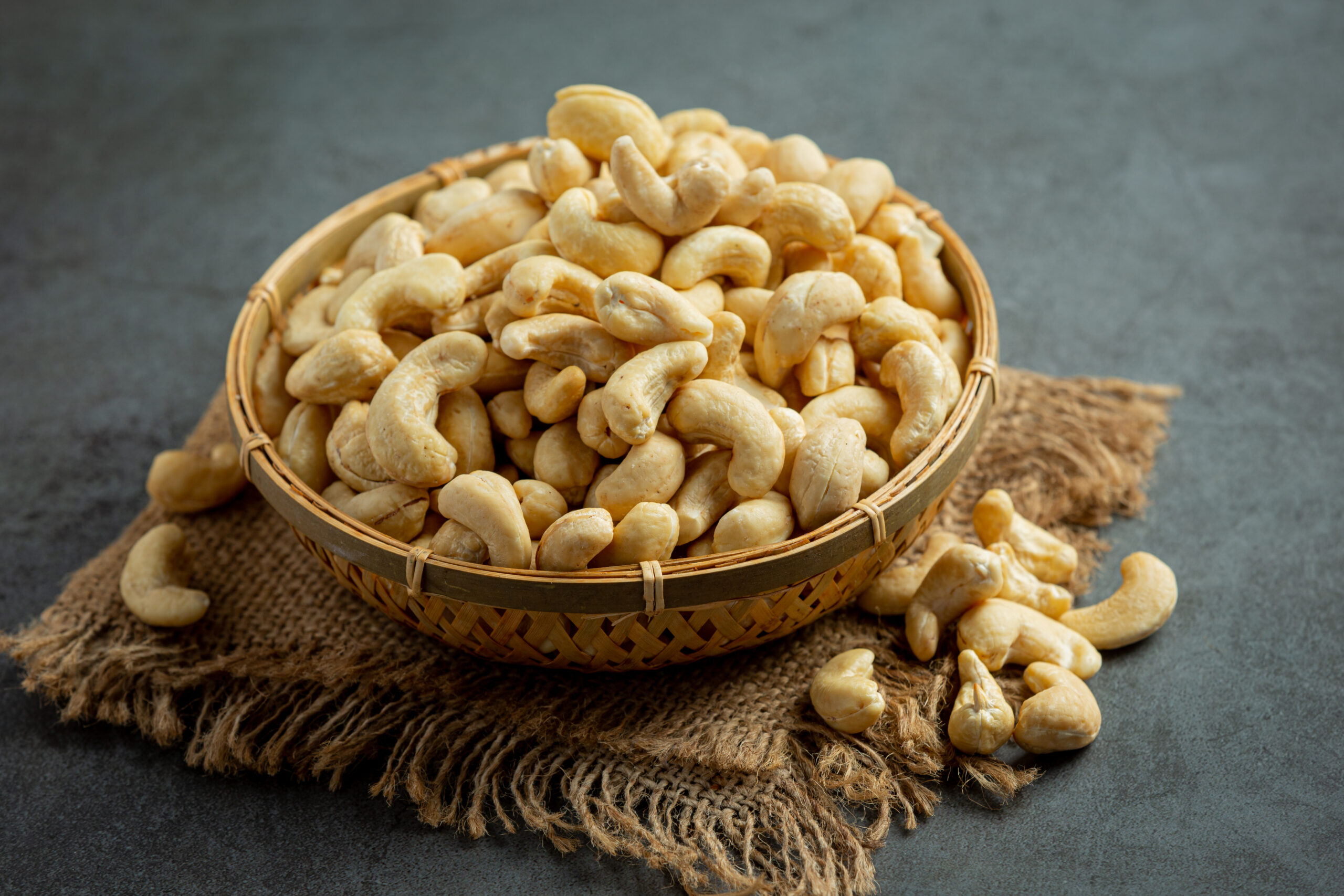 raw-cashews-nuts-bowl-dark-background